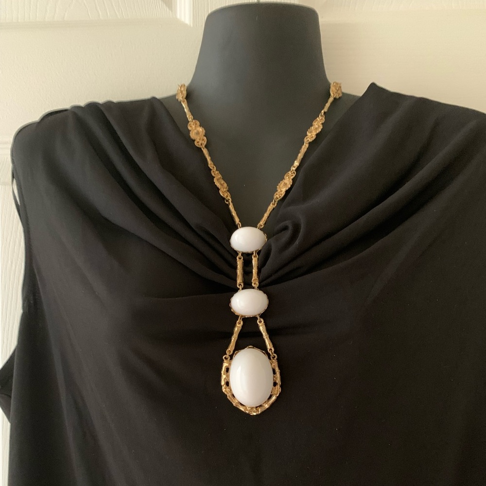 Vintage gold finish and white acrylic accented necklace